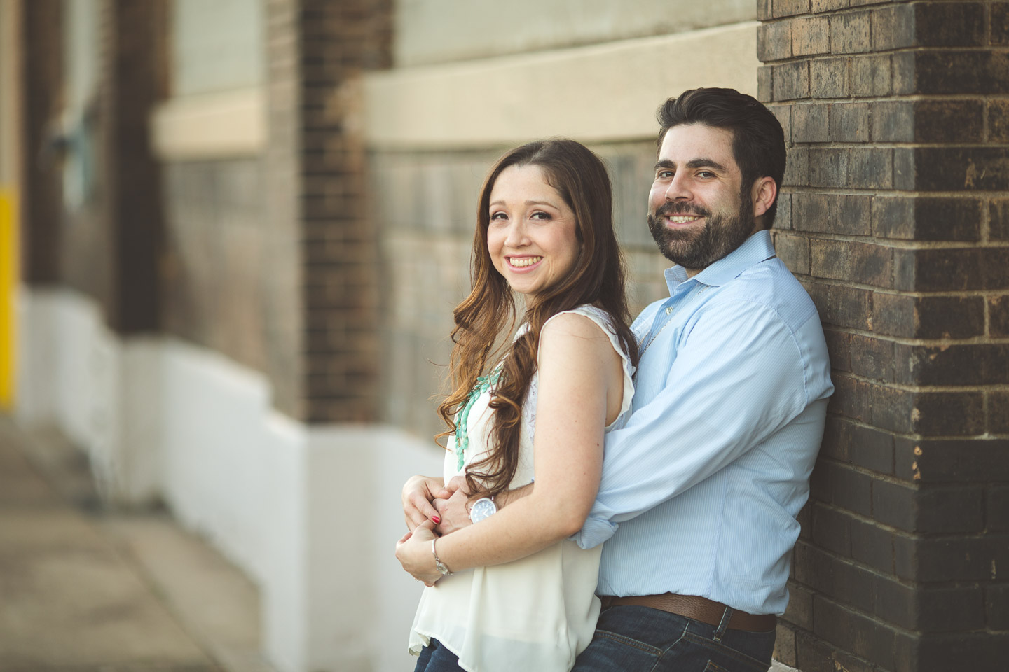 Detroit-Engagement-Session-Couple-Leaning-On-Wall