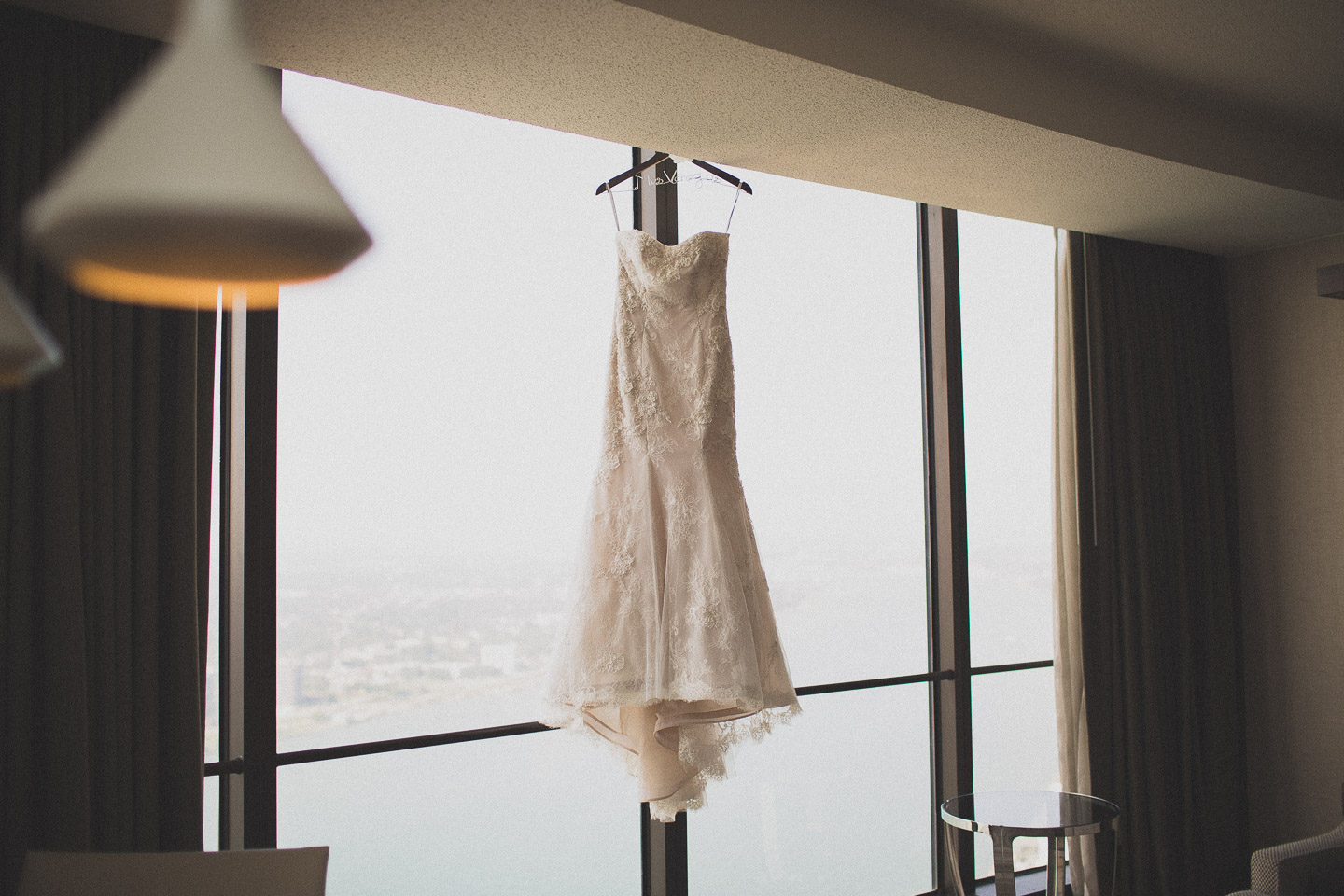 Detroit-Renaissance-Center-Marriott-Bride-Window-Wedding-Dress