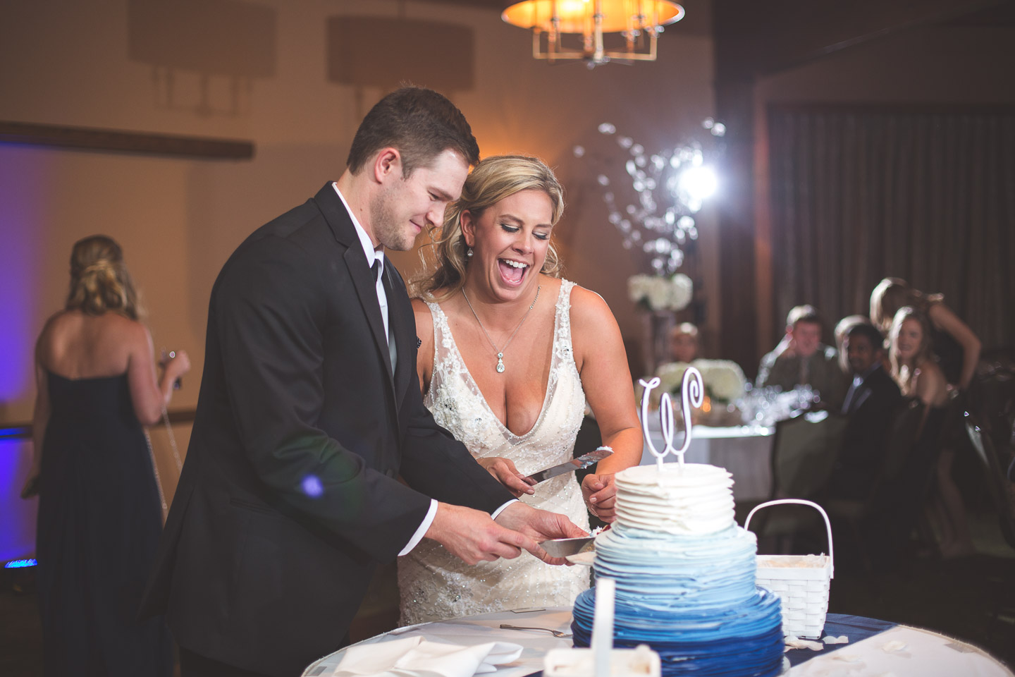 West-Bloomfield-Wedding-Michigan-Bay-Pointe-Golf-Club-Reception-Bride-Groom-Cut-Cake