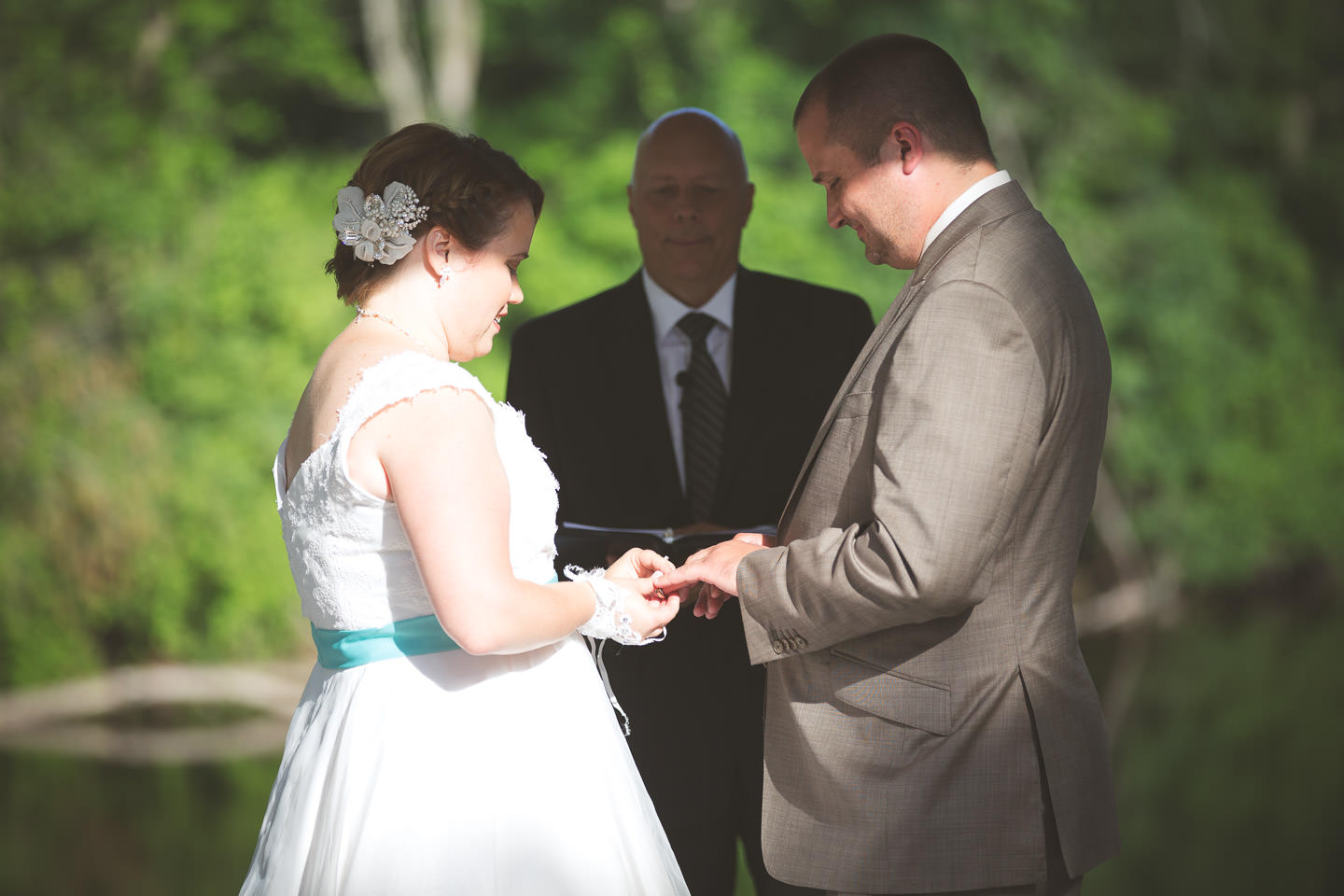 Lansing-Eaton-Rapids-English-Inn-Wedding-Ceremony-Exchange-Rings
